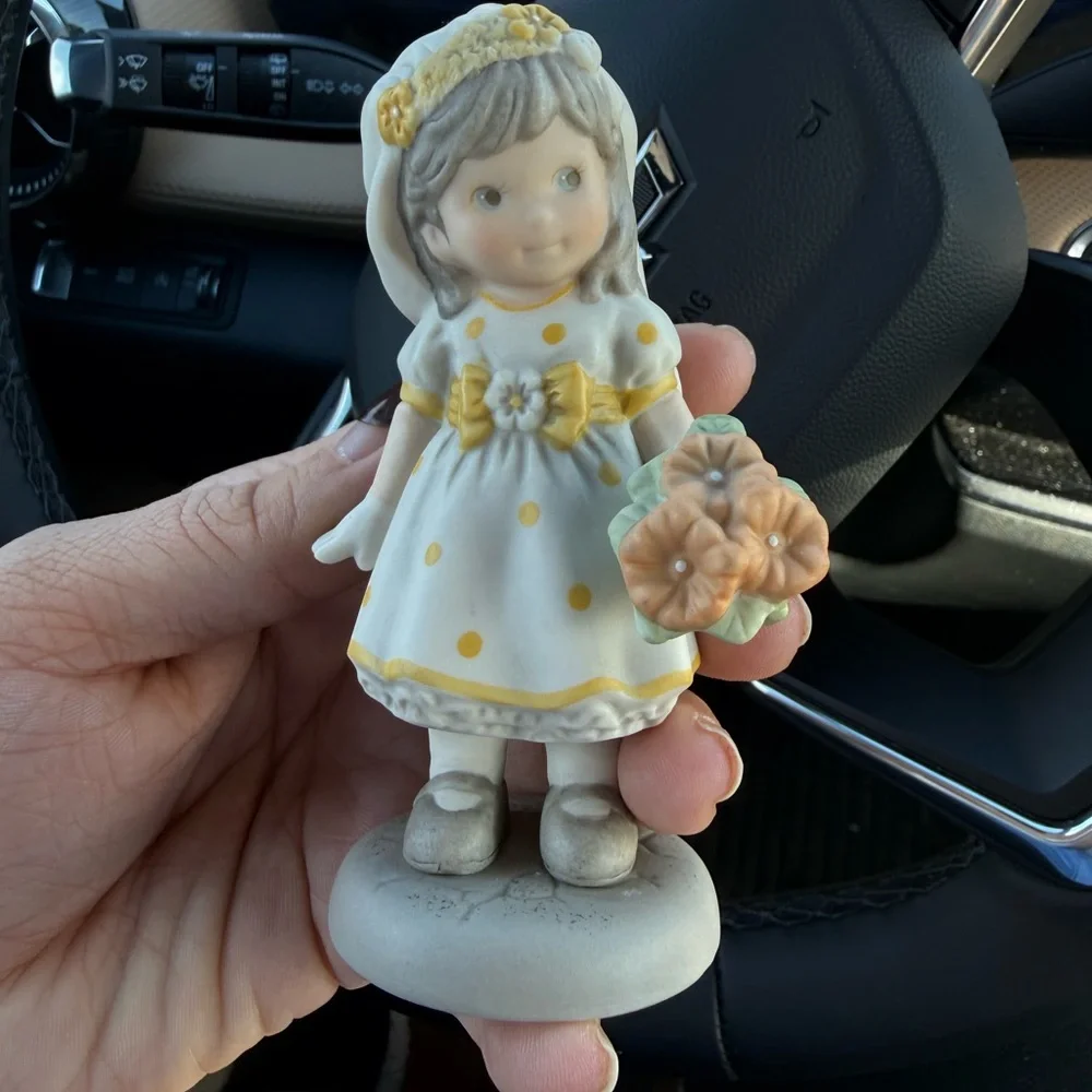 Charming Girl Figurine with Yellow Accents